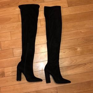 Thigh high black boots
